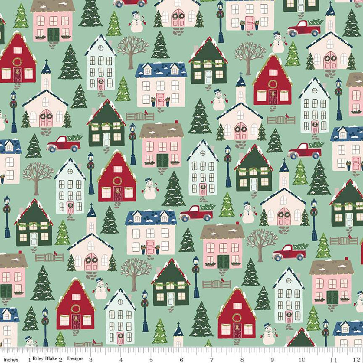 Christmas Village by Katherine Lenius for Riley Blake Designs is great for quilting, apparel and home decor. This print features a village of snow-covered houses, trees, snowmen and more. 100% cotton Width: 43"/44"