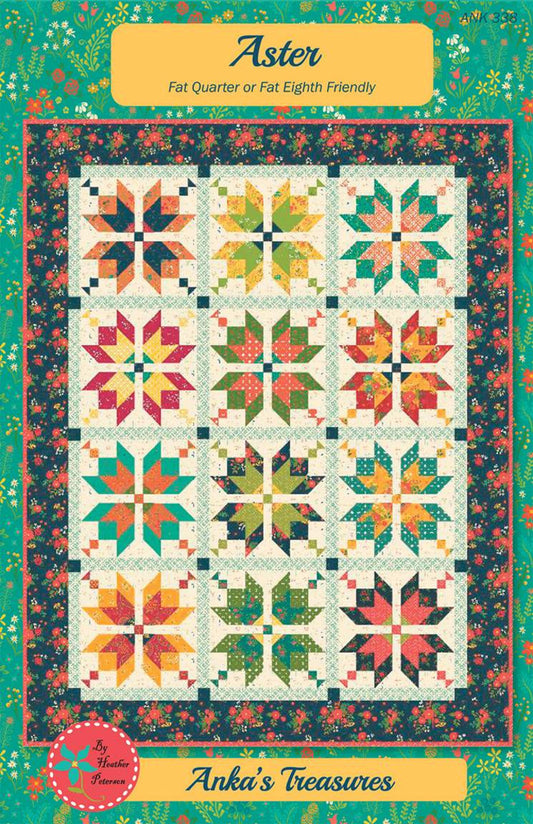The Aster Quilt by Heather Peterson of Anka's Treasures is fat quarter friendly and features 12 pieced blocks set with sashing and posts. Finished size is 59 1/2" x 75 1/2".