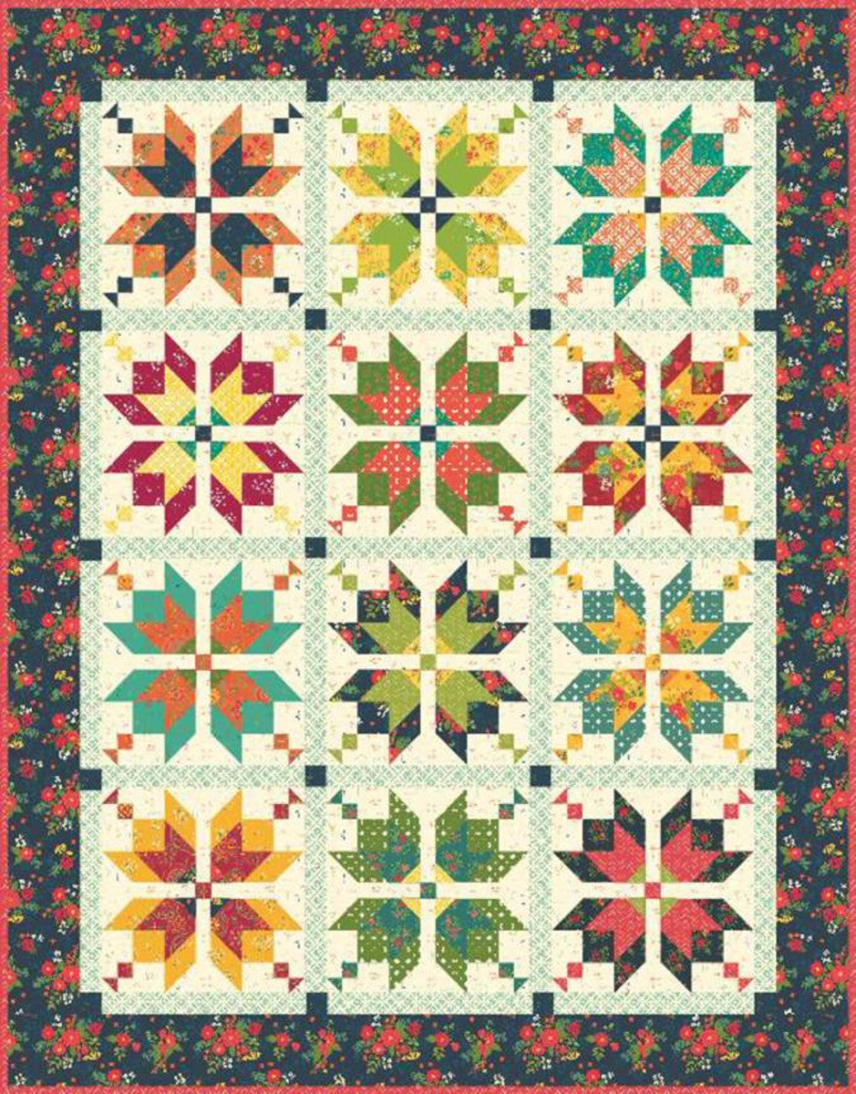 The Aster Quilt by Heather Peterson of Anka's Treasures is fat quarter friendly and features 12 pieced blocks set with sashing and posts. Finished size is 59 1/2" x 75 1/2".