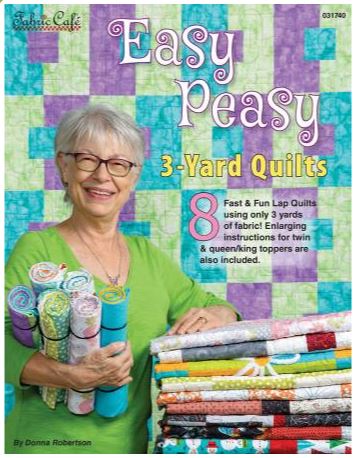 Fabric Cafe easy peasy 3 yard quilts book- 8 fast and fun lap quilts using only 3 yards of fabric  Simply take one-yard cuts of each of three fabrics and piece a beautiful quilt top with binding and borders Includes an Assembly diagram and step-by-step directions and enlarging instructions for Twin and Queen or King toppers.  Pages: 20 Author: Donna Robertson Publish Date: 2020 Dimensions: 11in x 8.5in x 0.06in Softcover