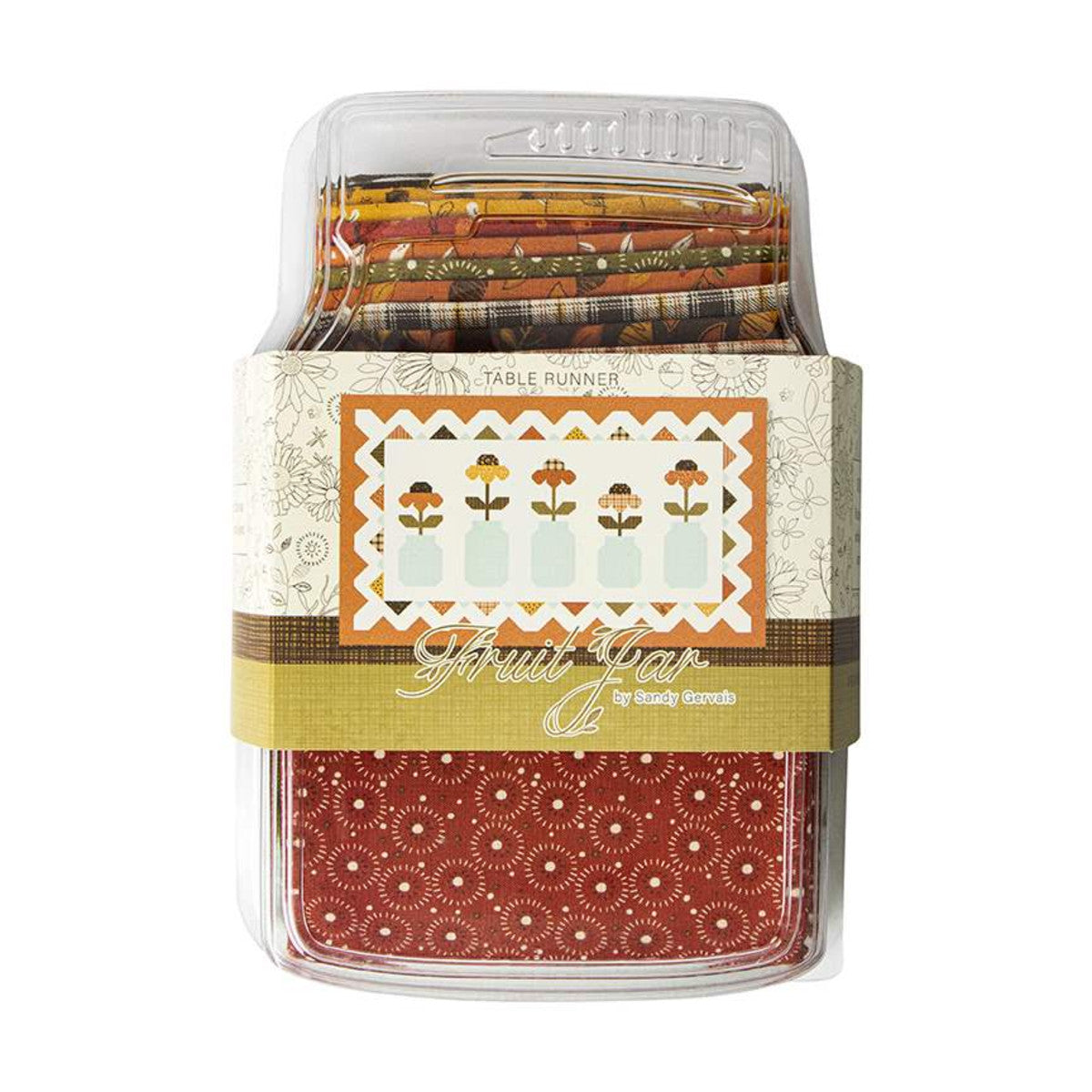 The Fruit Jar Autumn Runner Boxed Kit includes pattern and fabric for quilt top and binding. Backing not included. Fabric featured is Adel in Autumn by Sandy Gervais. Pattern is also by Sandy Gervais of Pieces from My Heart. Finished size is 32" x 56". Table runner kit comes in a reusable, plastic, jar-shaped box. Box size is approximately 6" x 10 3/4" x 2 1/2".