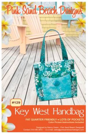 11-1/2in wide x 11-1/2in tall x 4in deep. This handbag has pockets galore! Features 2 pockets outside and 6 pockets inside. Magnetic snap closure. Fat quarter friendly. Great for classes and kits. Full color instructions with pictures. Use PSBD Magnetic purse snaps - #PSB210 (silver), #PSB211 (gold), #PSB212 (black).