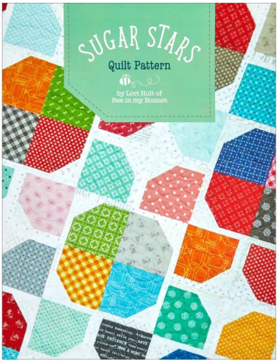 The Sugar Stars Quilt by Lori Holt of Bee in my Bonnet is 10-inch Stacker friendly. The quilt uses two 10-inch stackers to create a pieced floral design. Finished size is 60" x 80".
