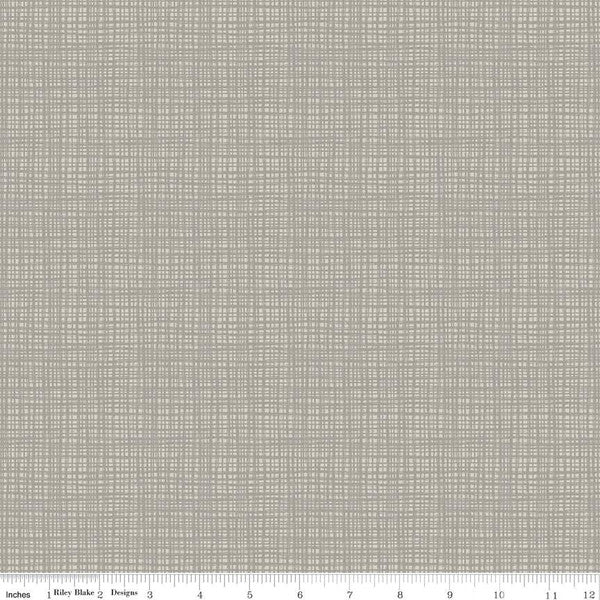 This Riley Blake Designs Basic fabric by Sandy Gervais for Riley Blake Designs features a tone-on-tone, sketched, irregular grid. It's perfect for quilting, apparel and home decor projects.  Sold by the 1/2 yard.  Fabric will be cut in one continuous piece unless the customer notes otherwise.  100% cotton  Width: 43"/44"